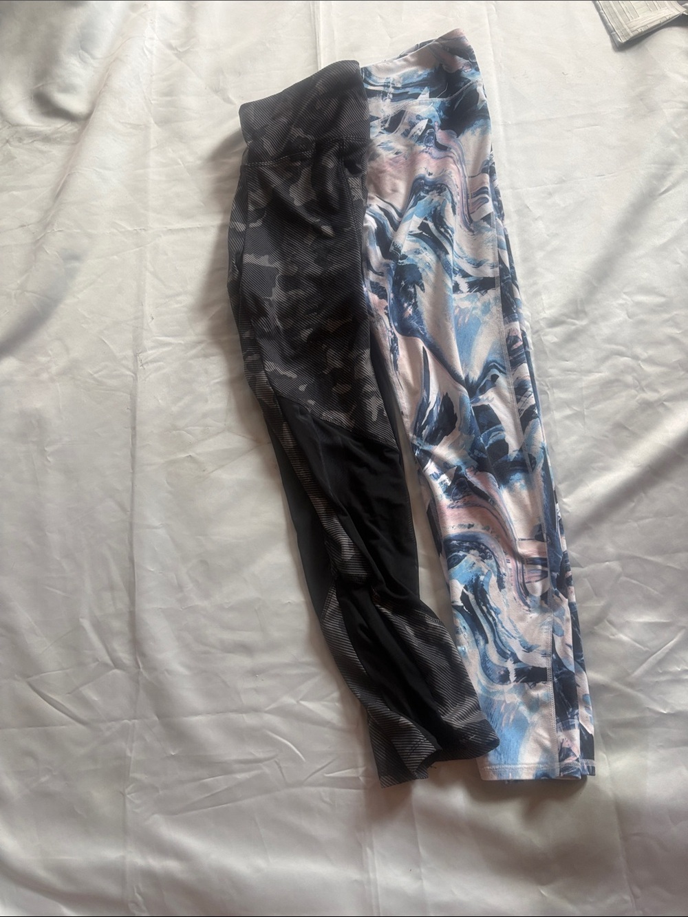 Fabletics woman’s ' Black Camo and Blue-Pink Marble Leggings